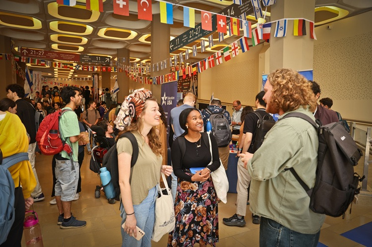 huji intl day 2025 small crowd of students talking